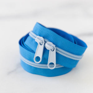 30” Clear Sky Zipper - Light Blue Coil & Pulls